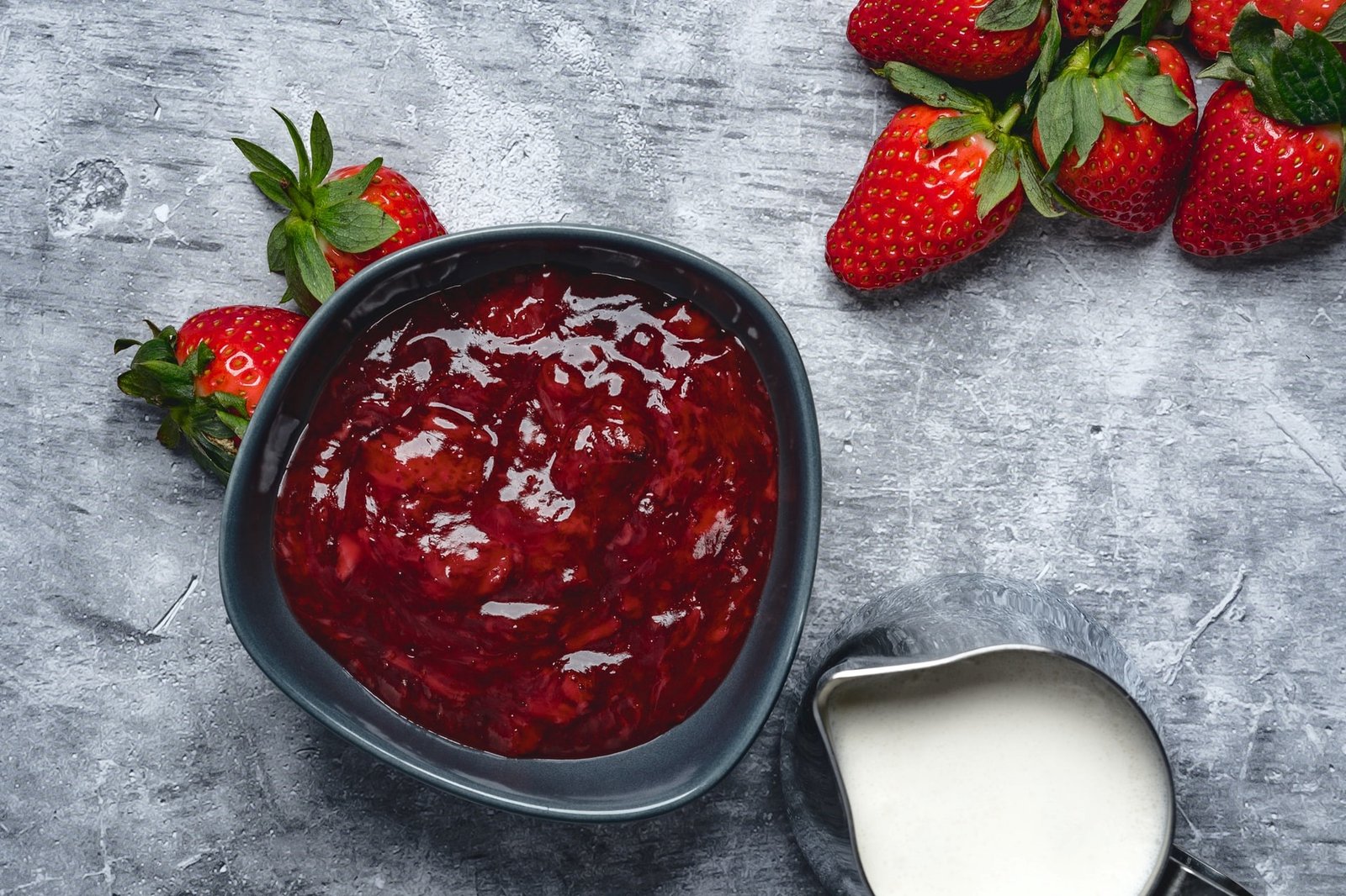 pot of strawberry jam and cream